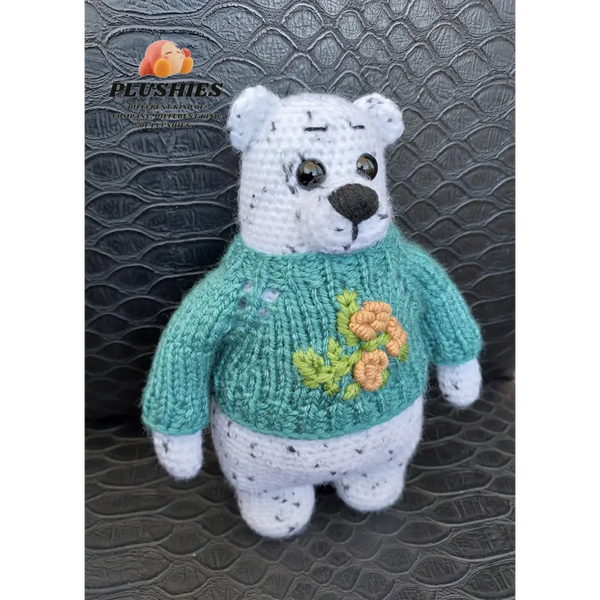 Stuffed polar bear wearing a sweater from Bear Chub product line