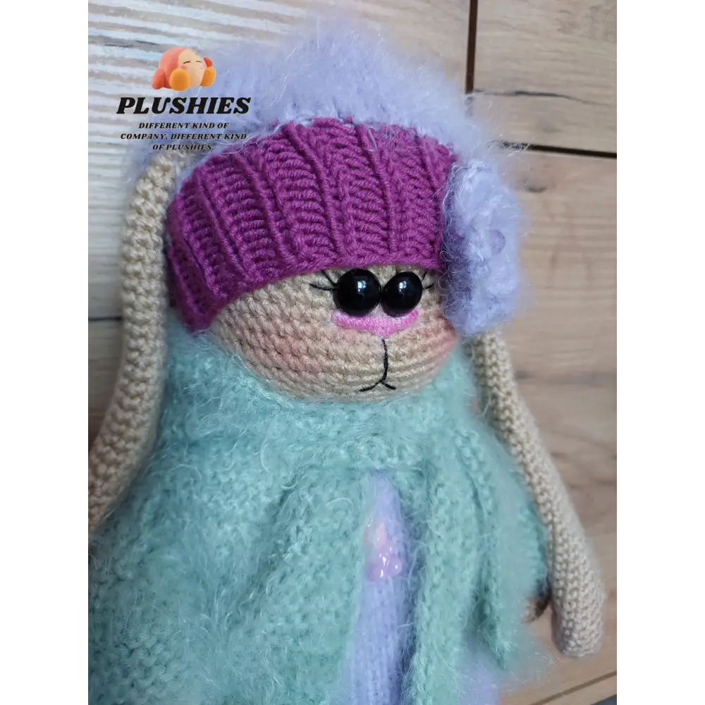 Bunny Minty stuffed animal in purple hat and blue dress
