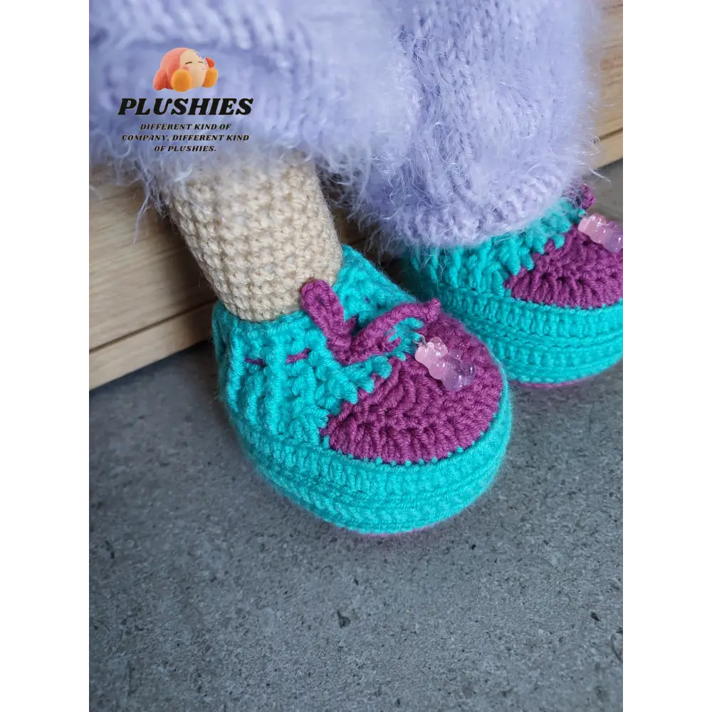 Person wearing purple and blue Bunny Minty slippers