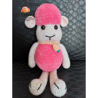 Pink hat and dress stuffed sheep toy