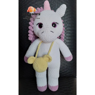 Yellow horned unicorn stuffed animal, product named Unicorn